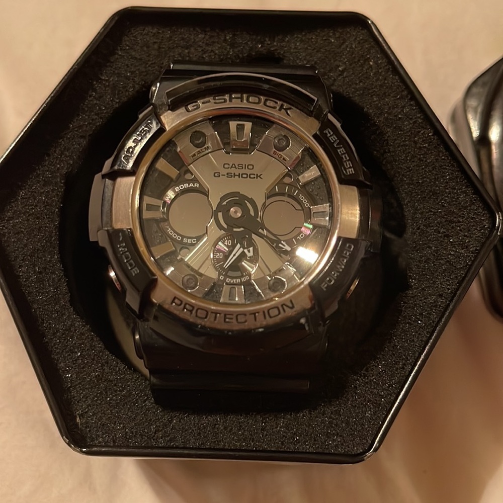 Mens G-Shock watch-black band with silver mechanical face